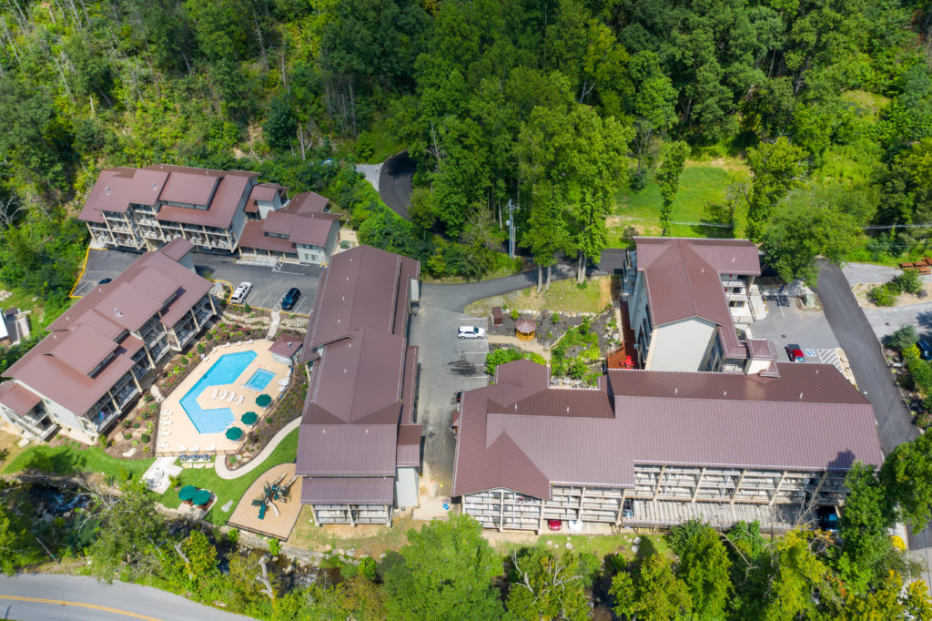 Aerial view of a multi family housing unit finished roofing project.